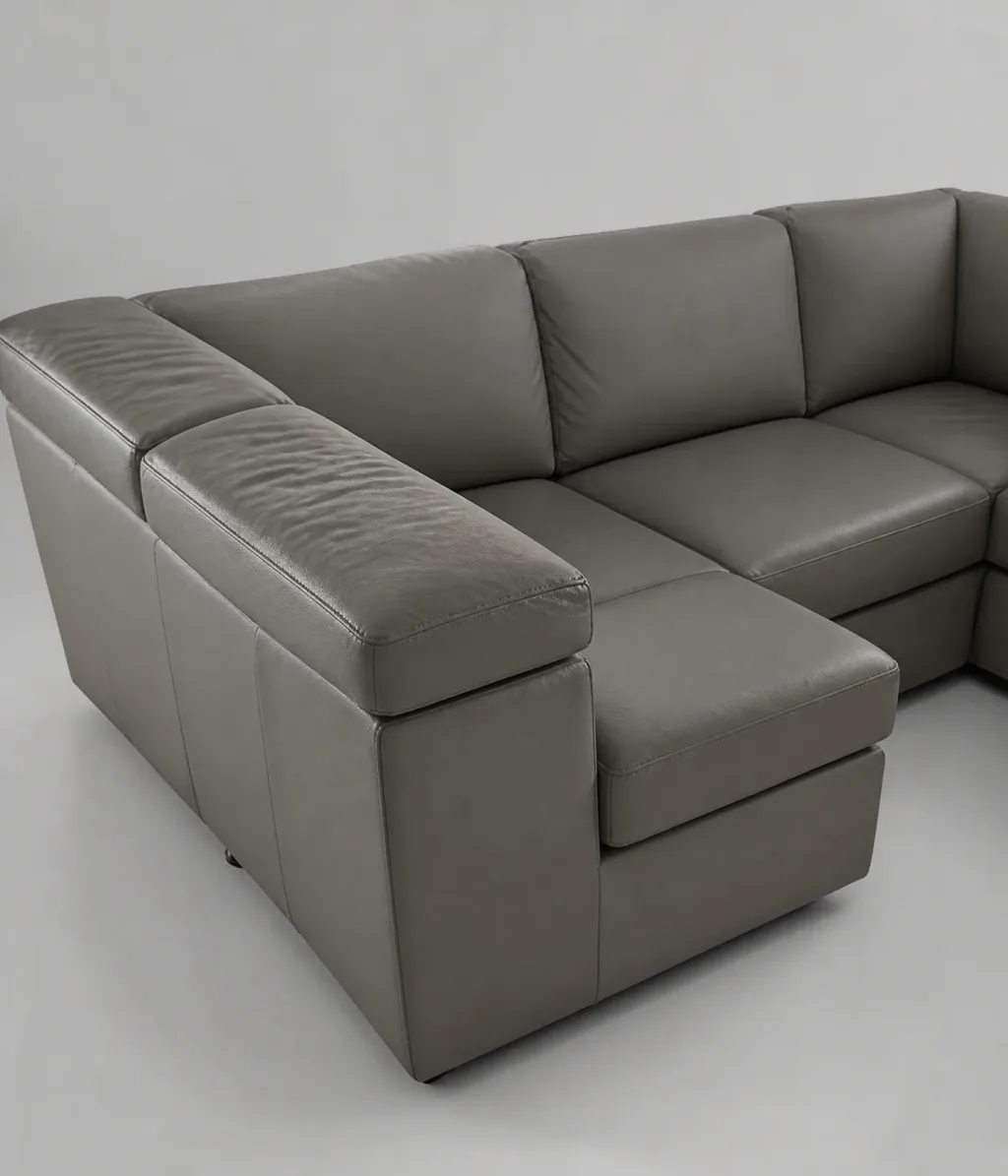Ledersofa Möbel reparieren: Chaiselongue-Teil mit stehendem Leder, das unangetastet blieb